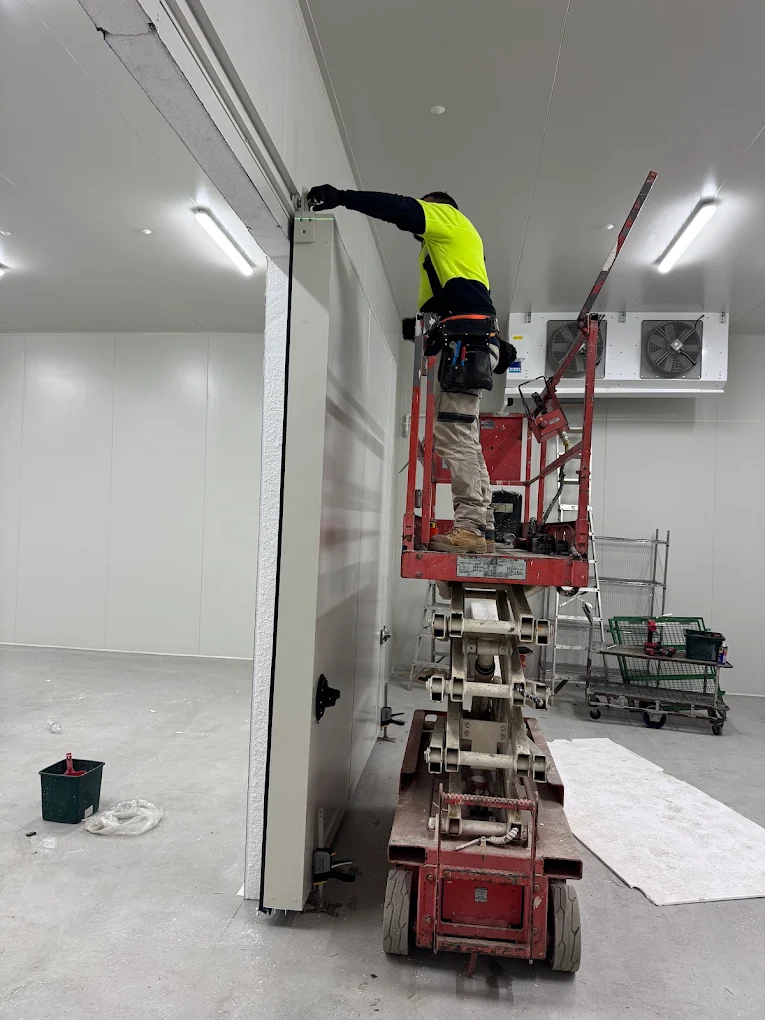 JAE technician installing cool room panels